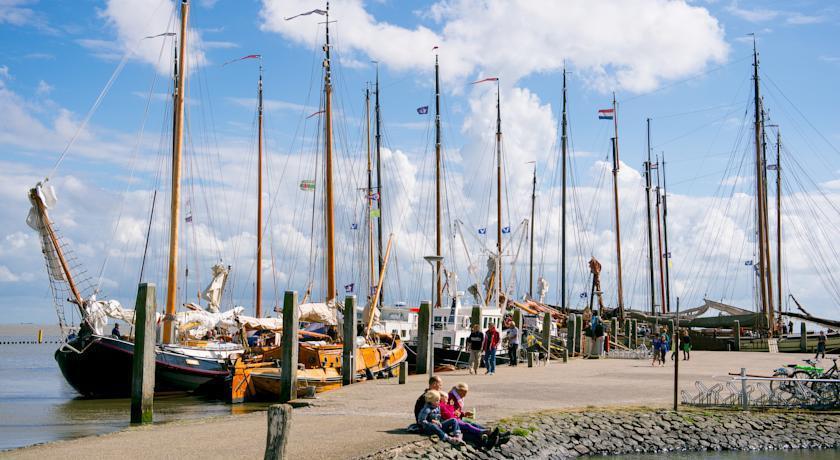 Aphrodite Met Zonnig Terras, Eigen Keuken, Verwarmd Hotel-Zwembad, Nabij Dorp, Duinen En Strand Hollum  Rum bild